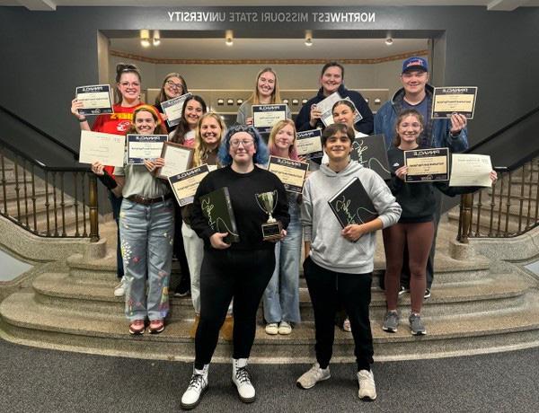 The Tower yearbook staff earned 14 awards at the Fall National Media Convention, including a Best in Show award and Yearbook of the Year.